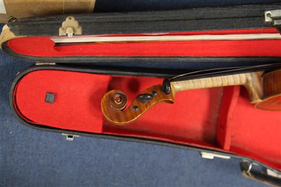 An English violin made by Arthur L. Scholes of Bedford, 23.5in., cased with two bows
